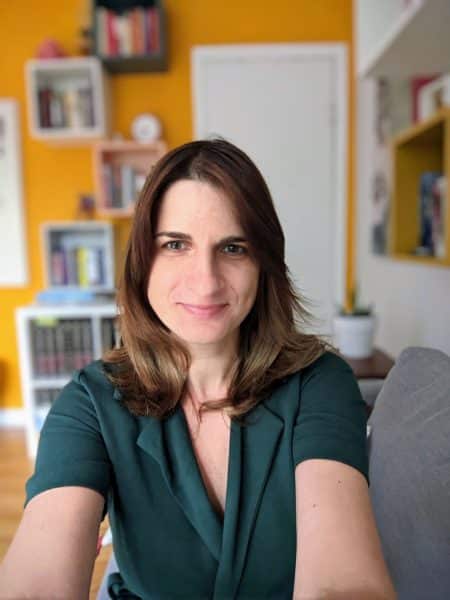 Lux Research Alina Strugut Research Director headshot wearing a green shirt.