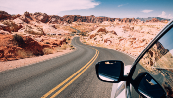 Car driving through desert