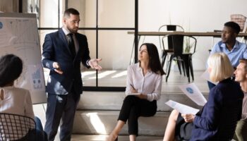Group of office workers have a discussion